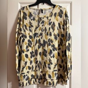 Glitzy Girls boutique leopard top. Mustard,cream, and brown colors.